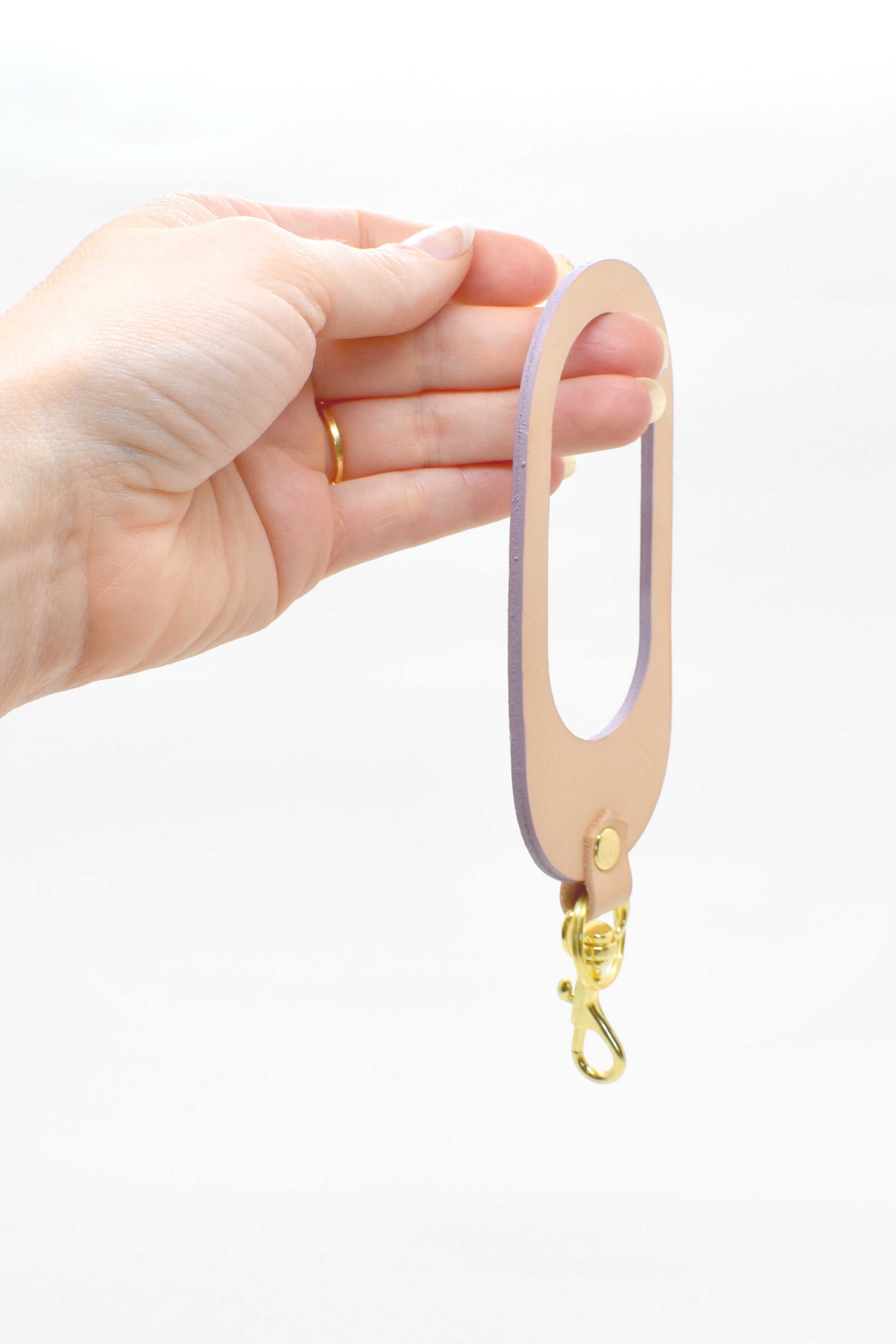 two sided multi color leather keychain with gold key ring and clasp in lavender pastel leather and veg tan leather