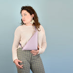 woman wearing leather sling bag purse in crossbody leather bag