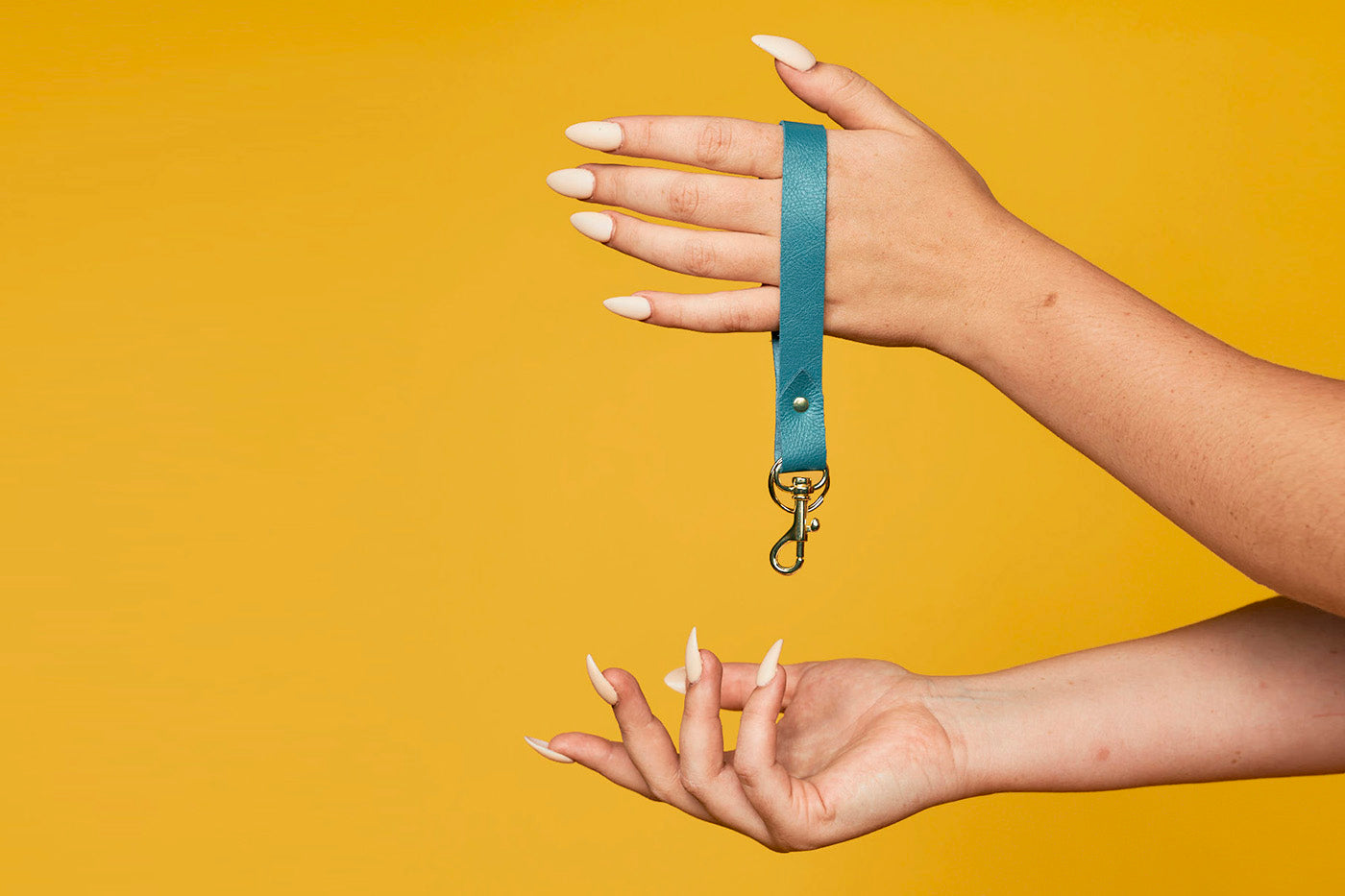 Cute minimal leather keychain in turquoise leather with brass accents
