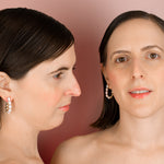 female models wearing baroque pearl and gold looped earrings with front to back design and sterling silver posts