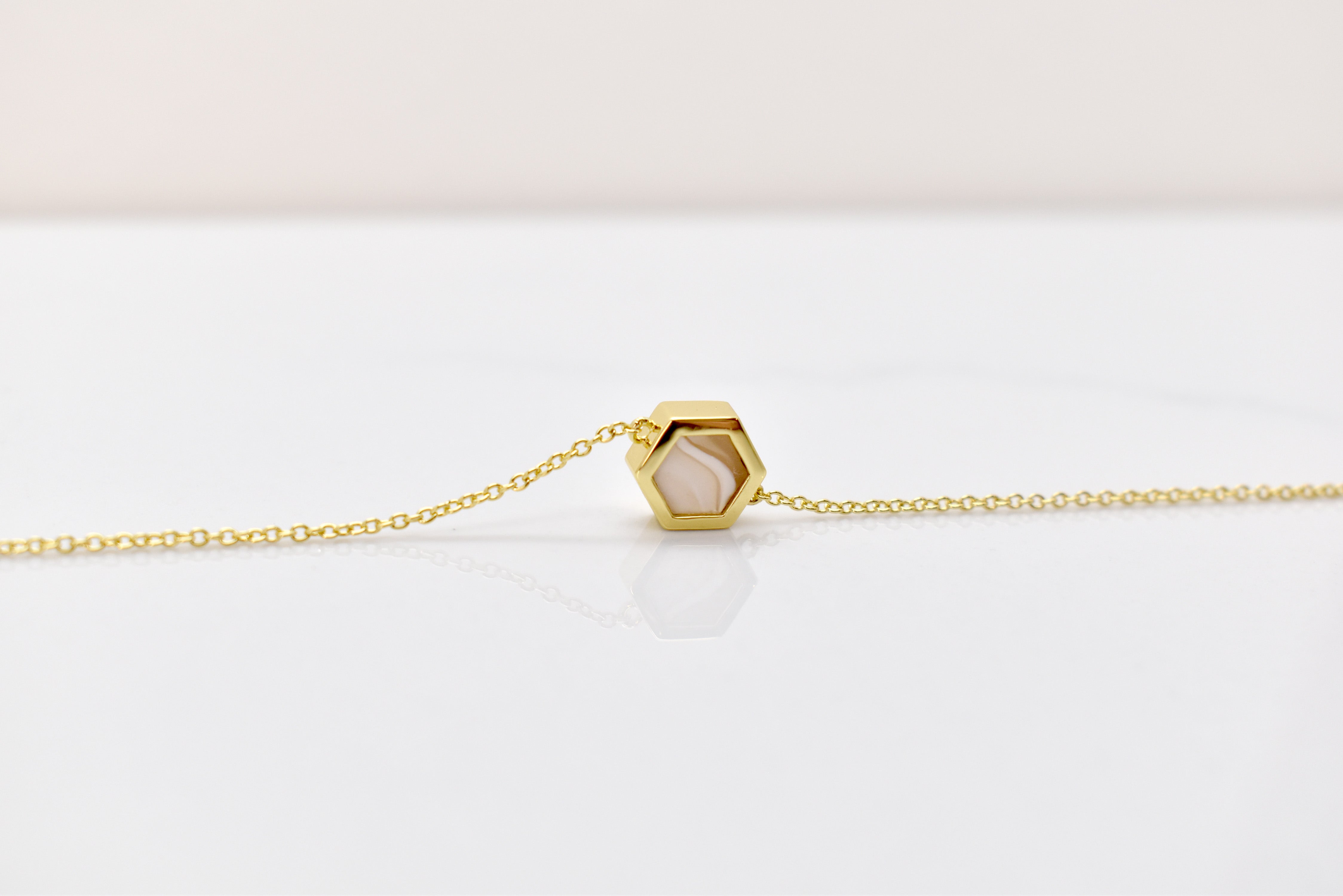 crystal quartz geometric necklace with 14k gold plating and hexagon jewelry
