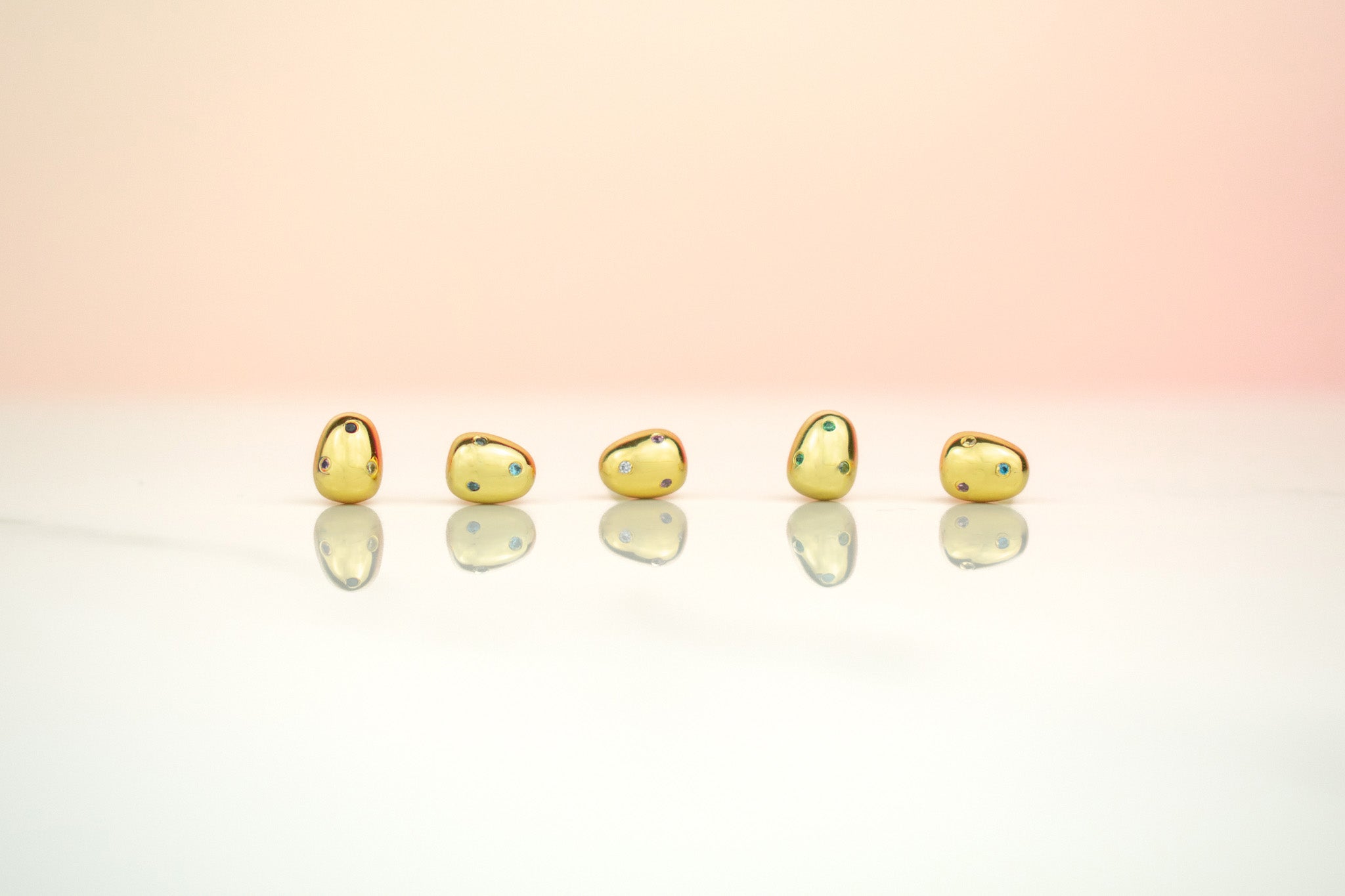 6mm baroque pearl modern unique studs encrusted with multicolored diamonds lined up in a row