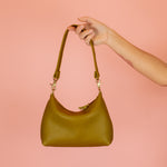 chic 90's style leather shoulder bag in olive green
