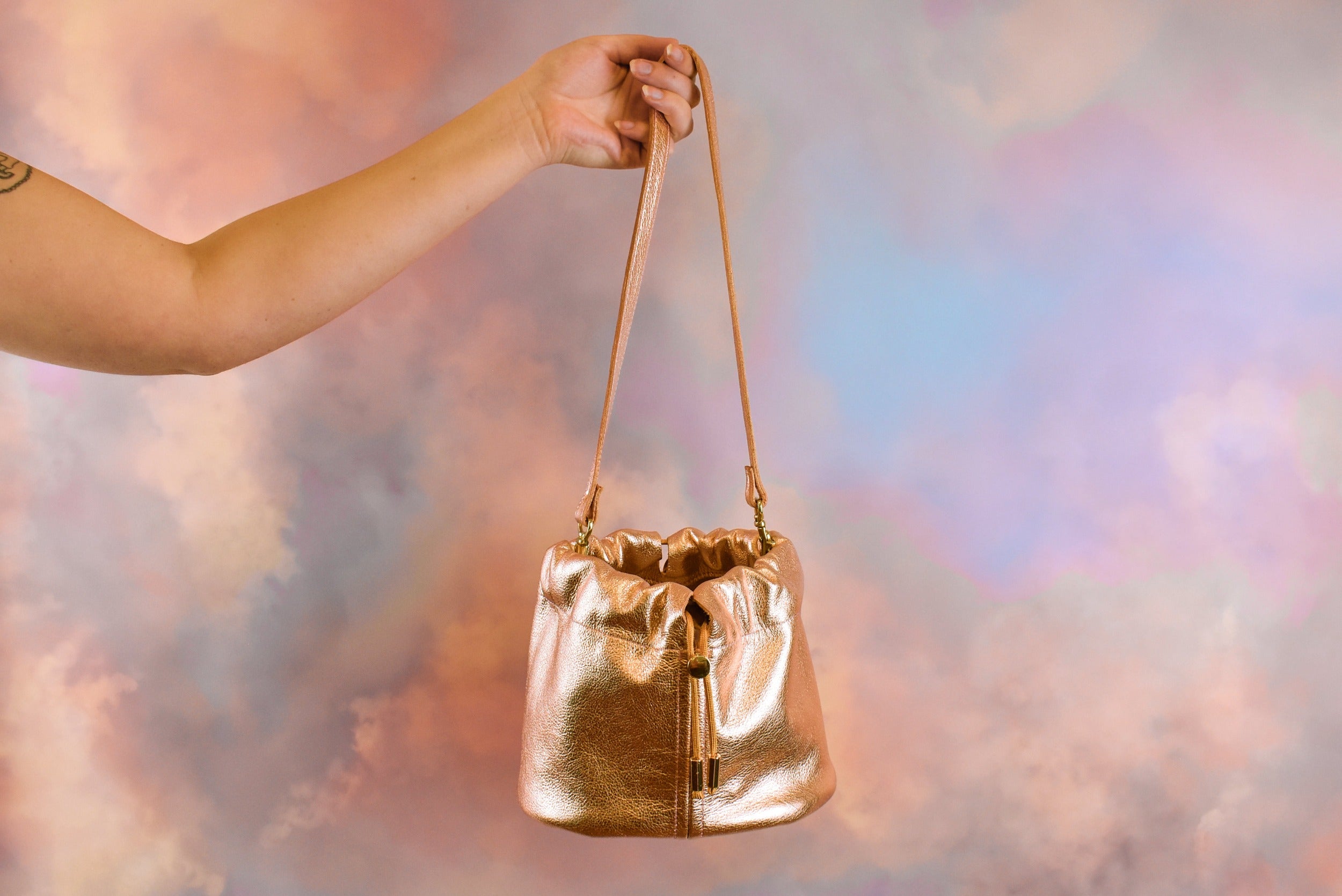 cute rose gold leather bucket bag scrunch top drawstring closure gift for girlfriend