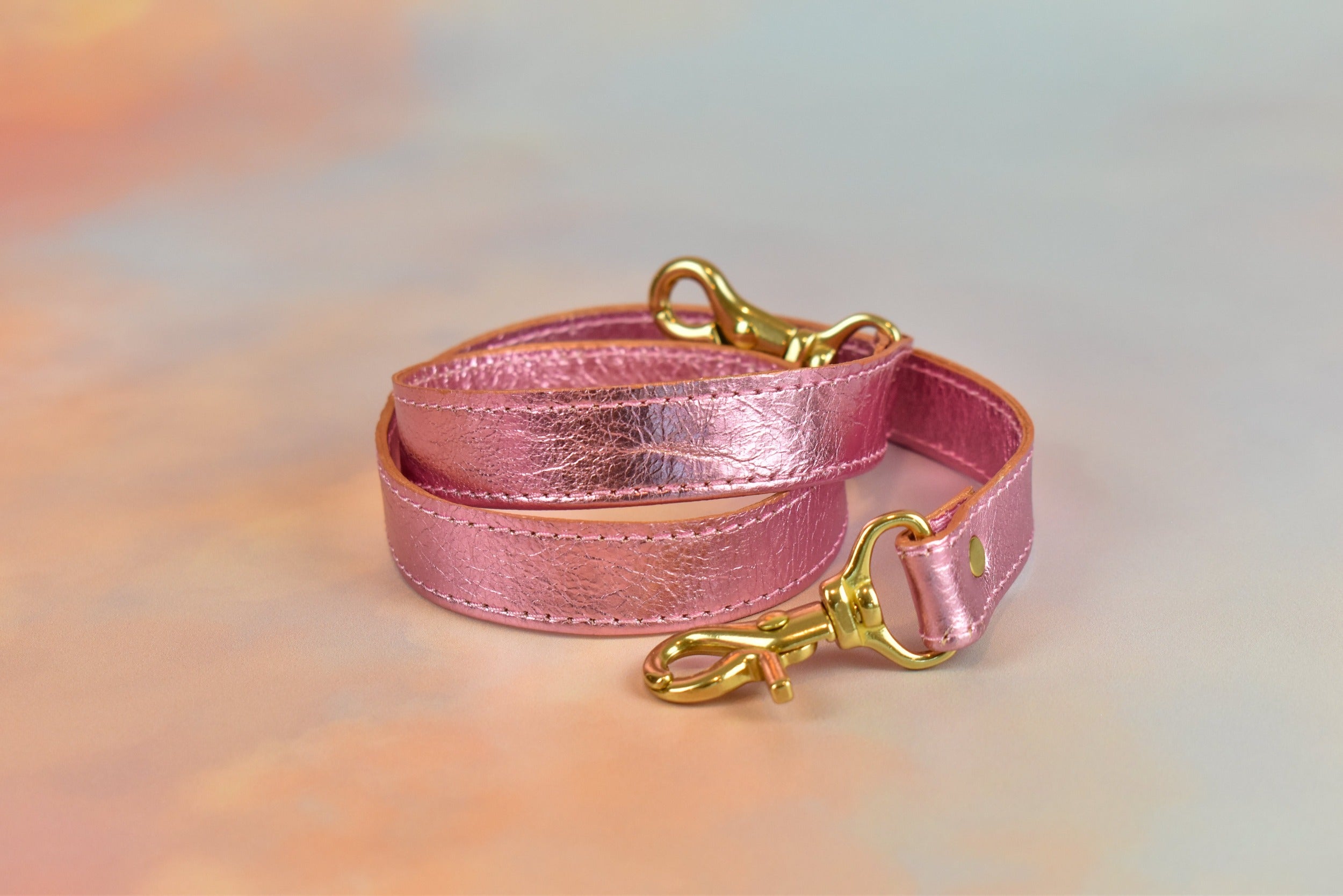matching metallic pink adjustable strap gold hardware
