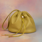 puce green leather chartreuse drawstring mini handbag