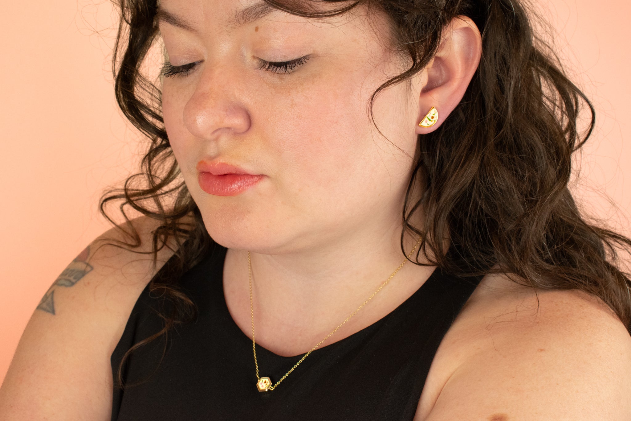 model wearing 14 gold plated matching rainbow terrazzo hexagon necklace and half moon earrings