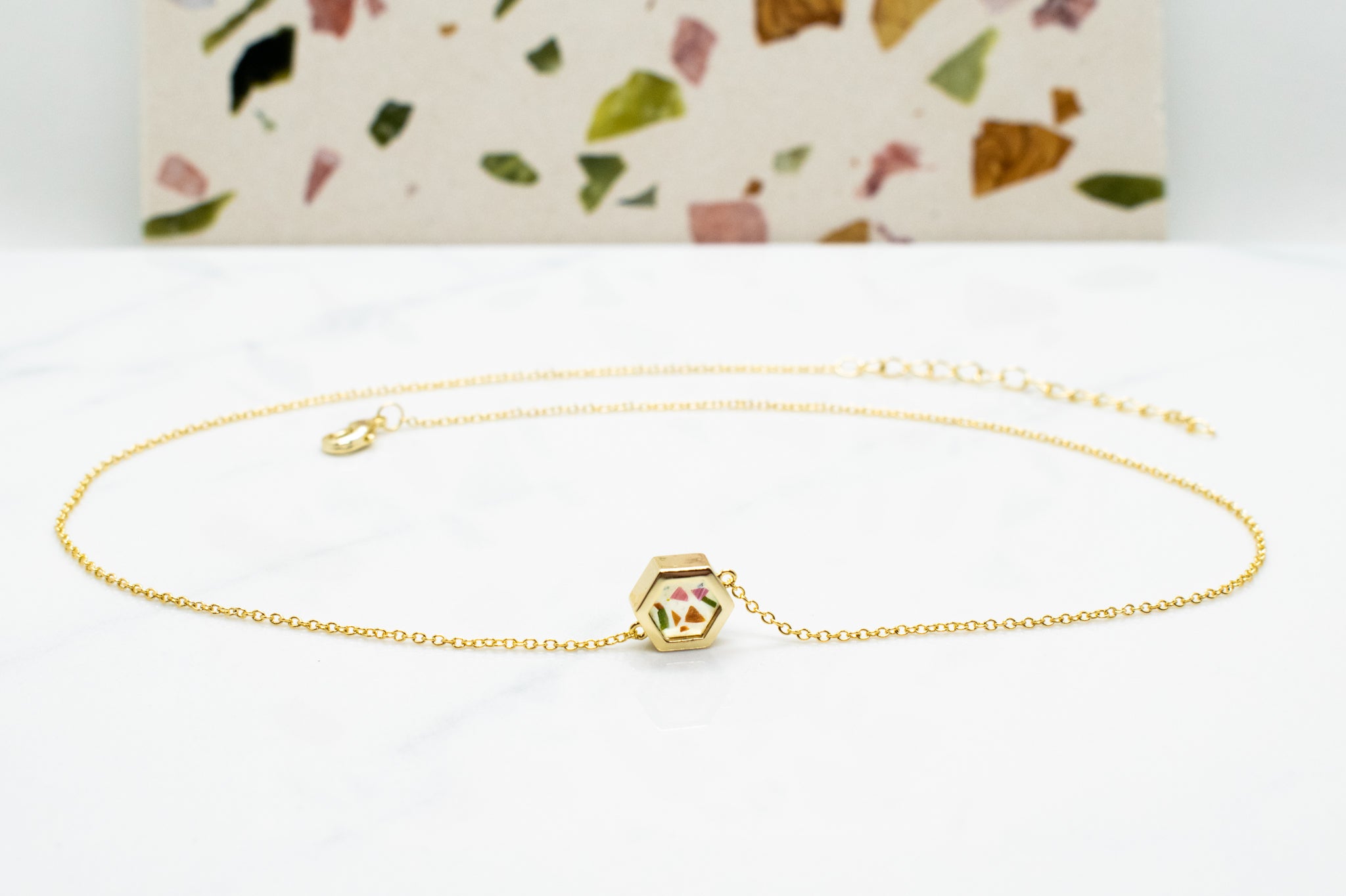 modern cable chain necklace with gold hexagon charm