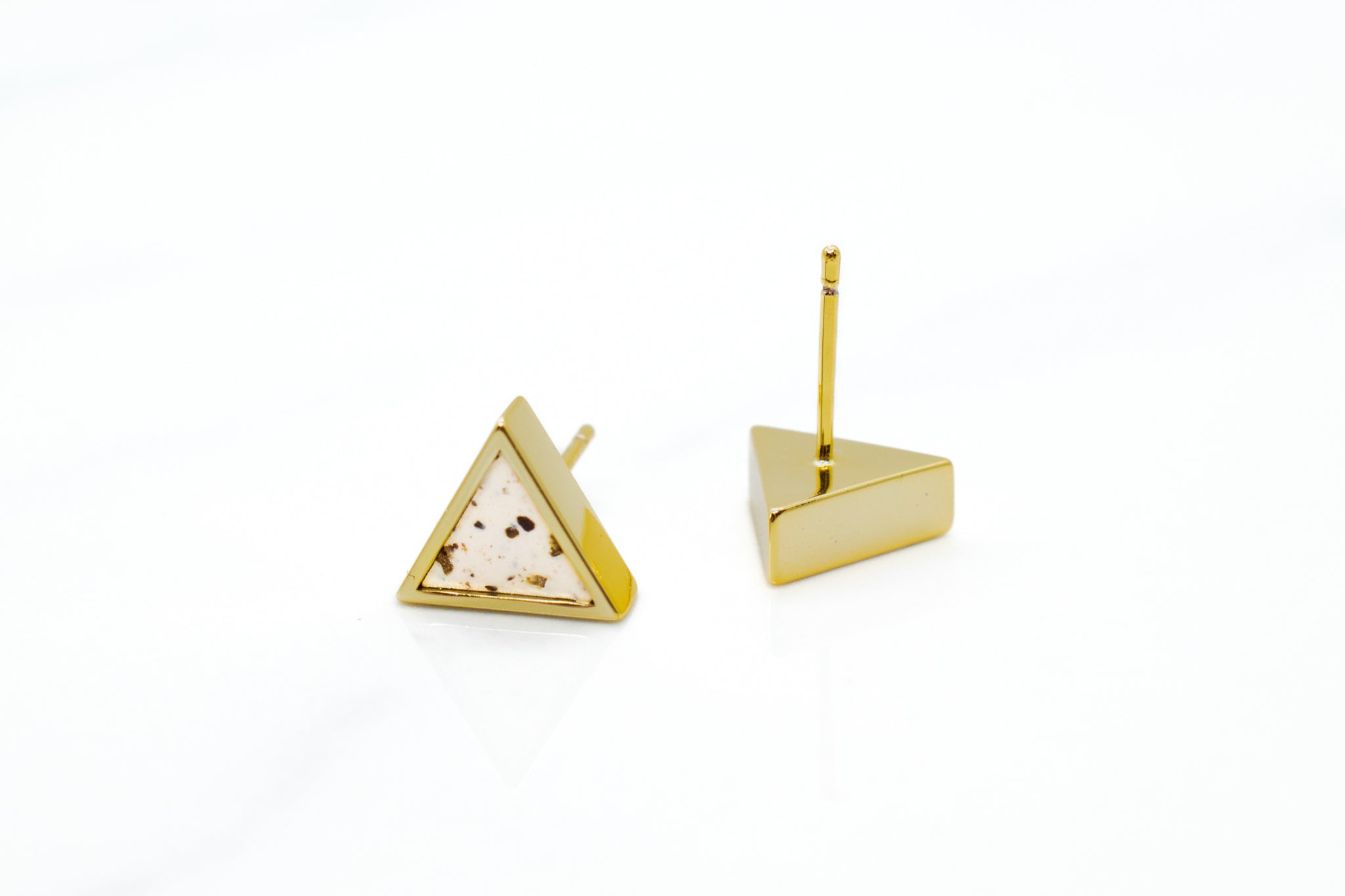 modern geometric triangle earrings in unique speckled stone clay