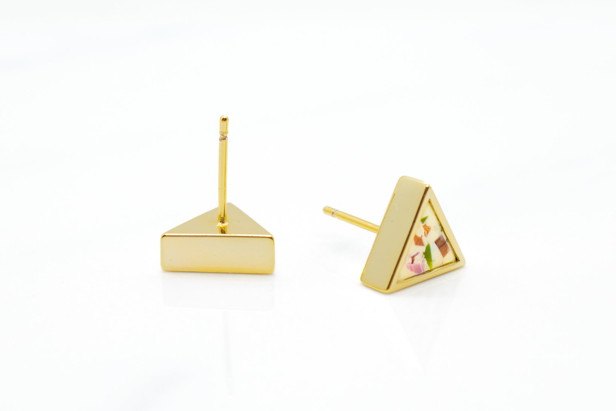 modern gold geometric triangle earrings in terazzo stone style