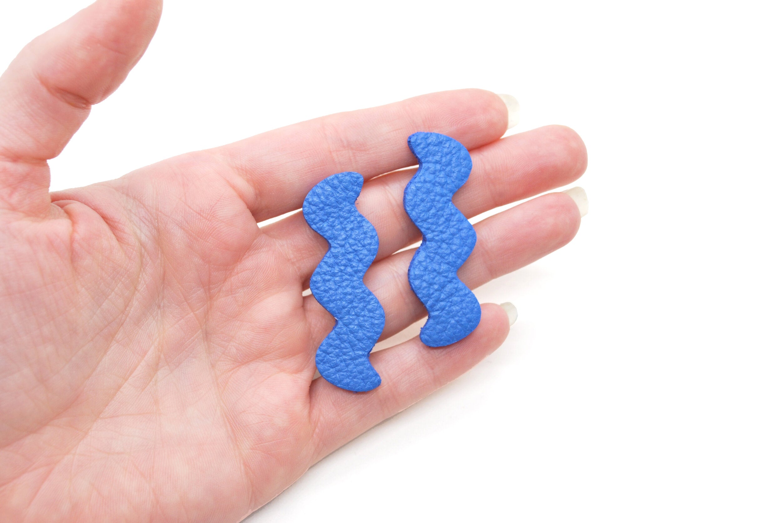 cobalt blue leather zig zag minimal and modern statement earrings.