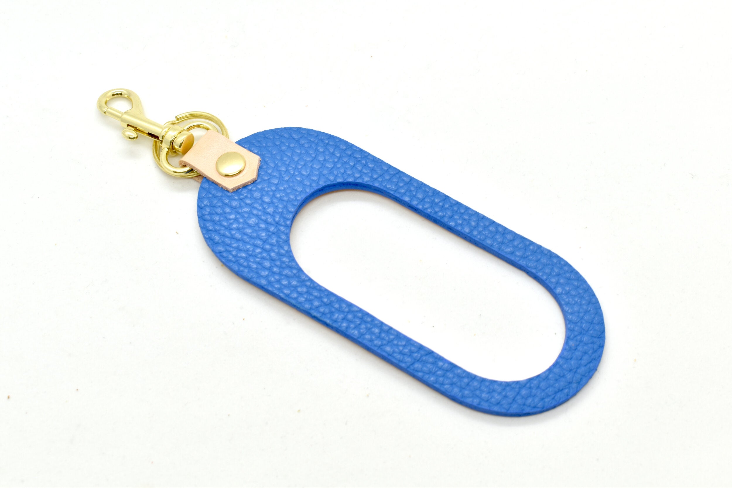 vegetable tanned rawhide and bright bold matisse blue leather finish keychain with gold hardware