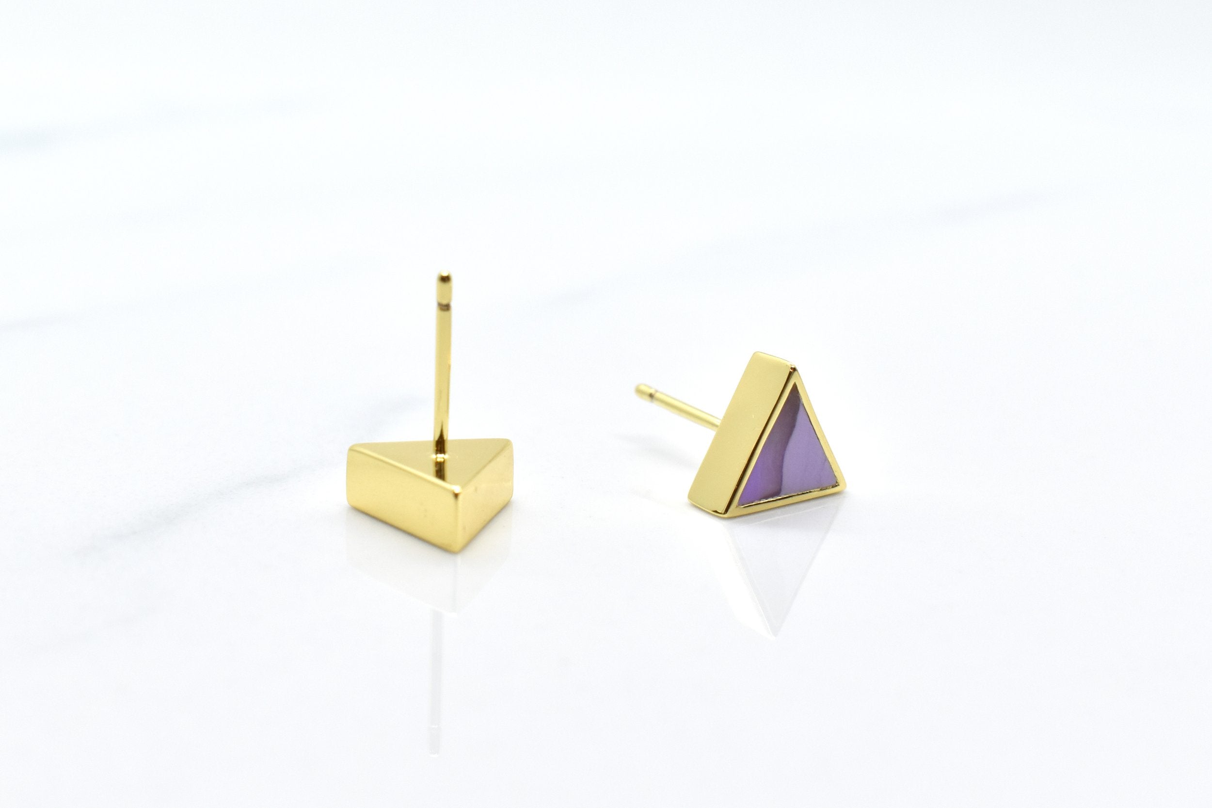 pastel purple clay and gold triangle earring set shown with one overturned. The back of the stud is smooth, gold, and gold plated in 14k gold