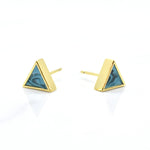 a pair of aquamarine and gold triangle stud earring set shown from the front on a white background
