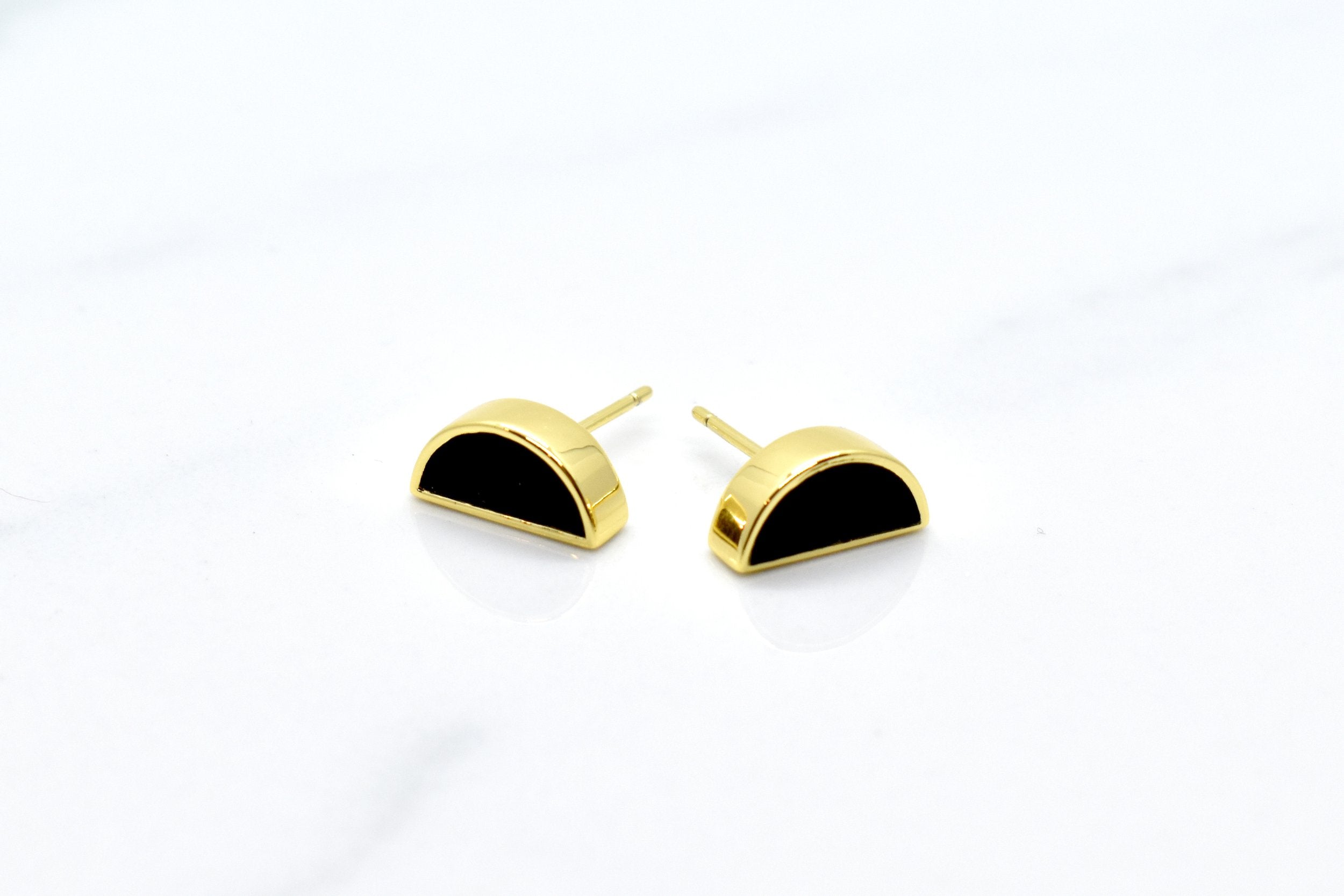 half moon stud earring set made of 14k gold and clay black gold earrings