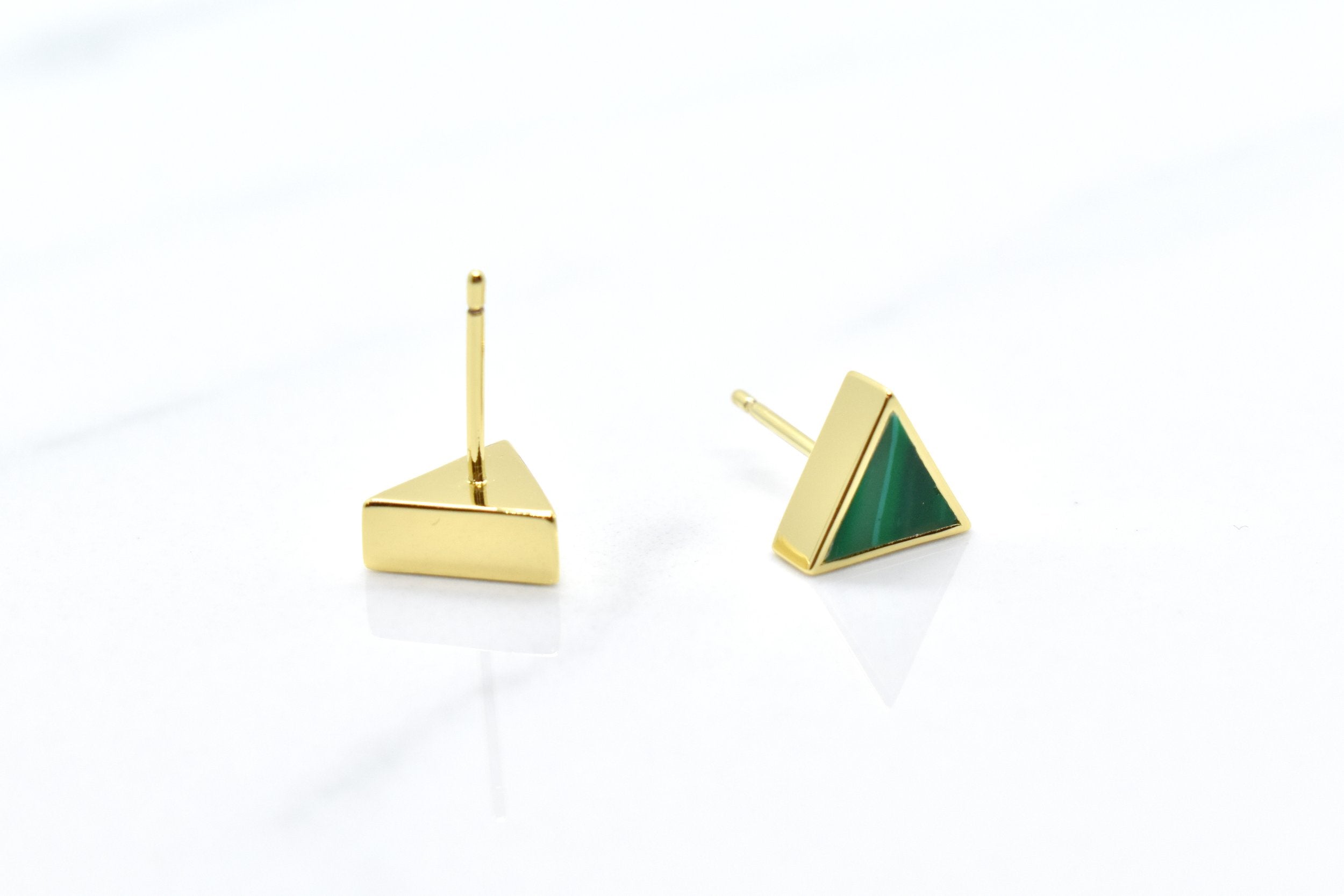geometric triangle stud earrings in jade green showing the backside where you can see the surgical steel posts that are hypoallergenic and good for sensitive ears