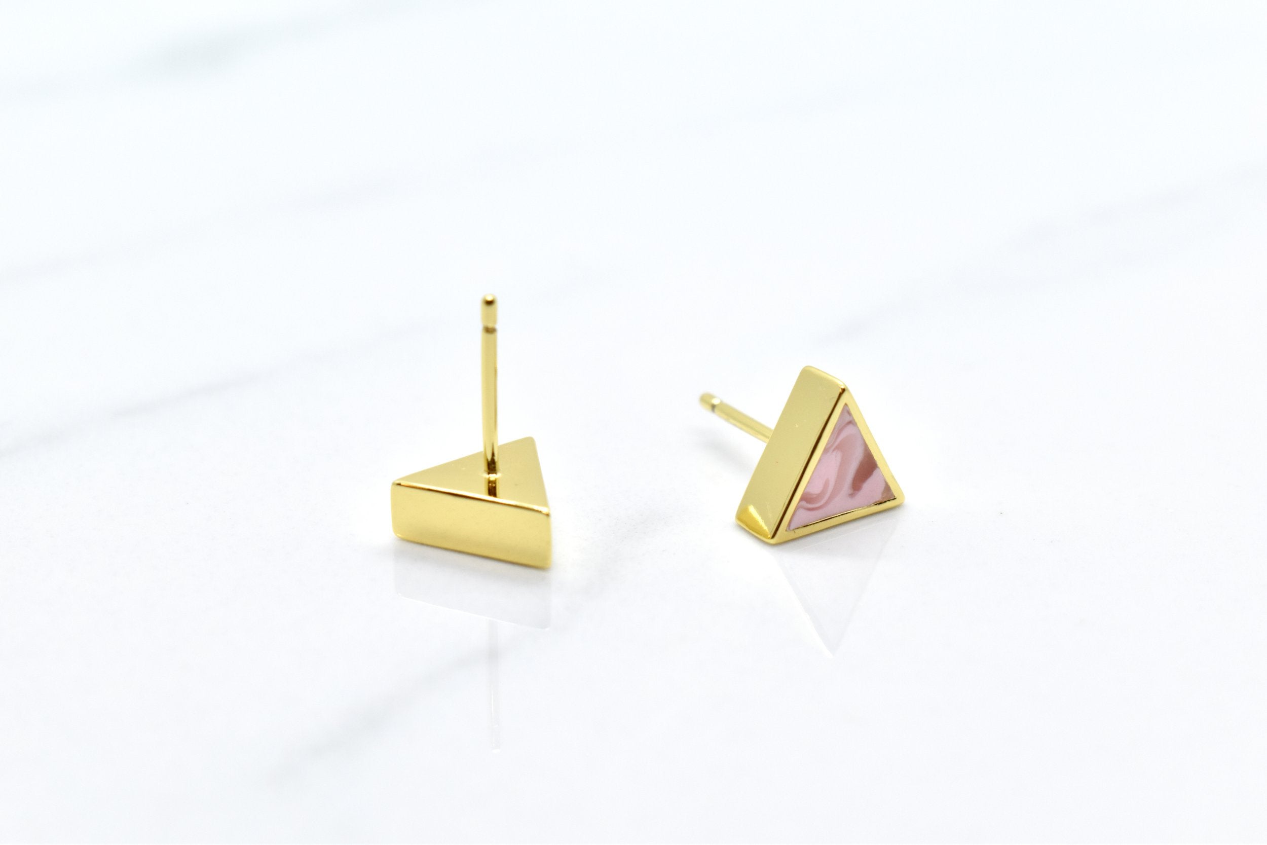 geometric triangle stud earrings in cotton candy pink.