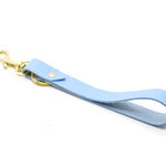 soft leather key fob wristlet in pastel periwinkle blue.