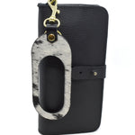 black leather catch all wallet with western cutout keychain