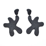 big, bold statement earrings in black leather matisse style.