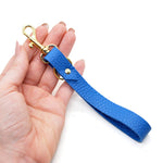 matisse blue authentic leather keychain with gold keyring and clasp.