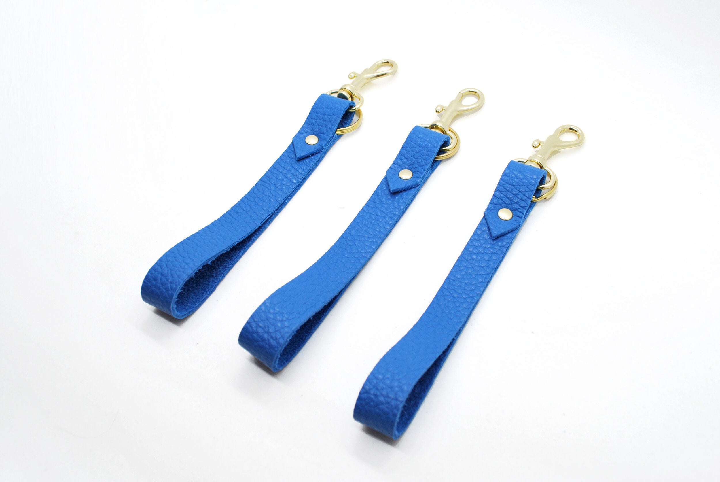 modern wristlet key chain loop in classic blue leather.