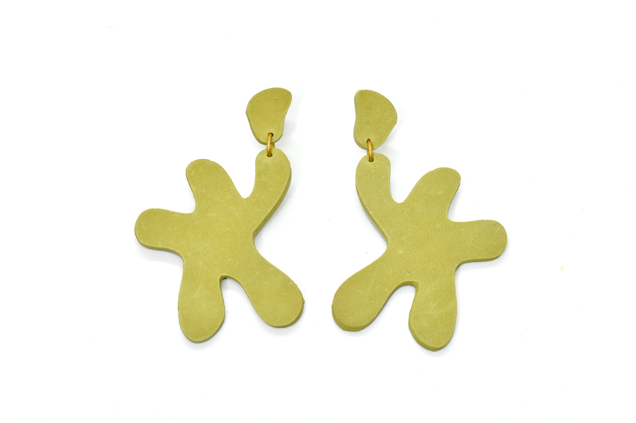real leather star shaped statement earrings in bold lime green leather