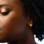 model wearing citrine studio stud earring set birth stone jewelry gemstone earring set gold geometric earrings