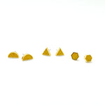 a few pairs of citrine clay stud earrings polymer earrings in geometric shapes hexagon triangle half moon tiny gold studs november birthstone present