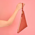 clay colored clutch bag with matching wristlet