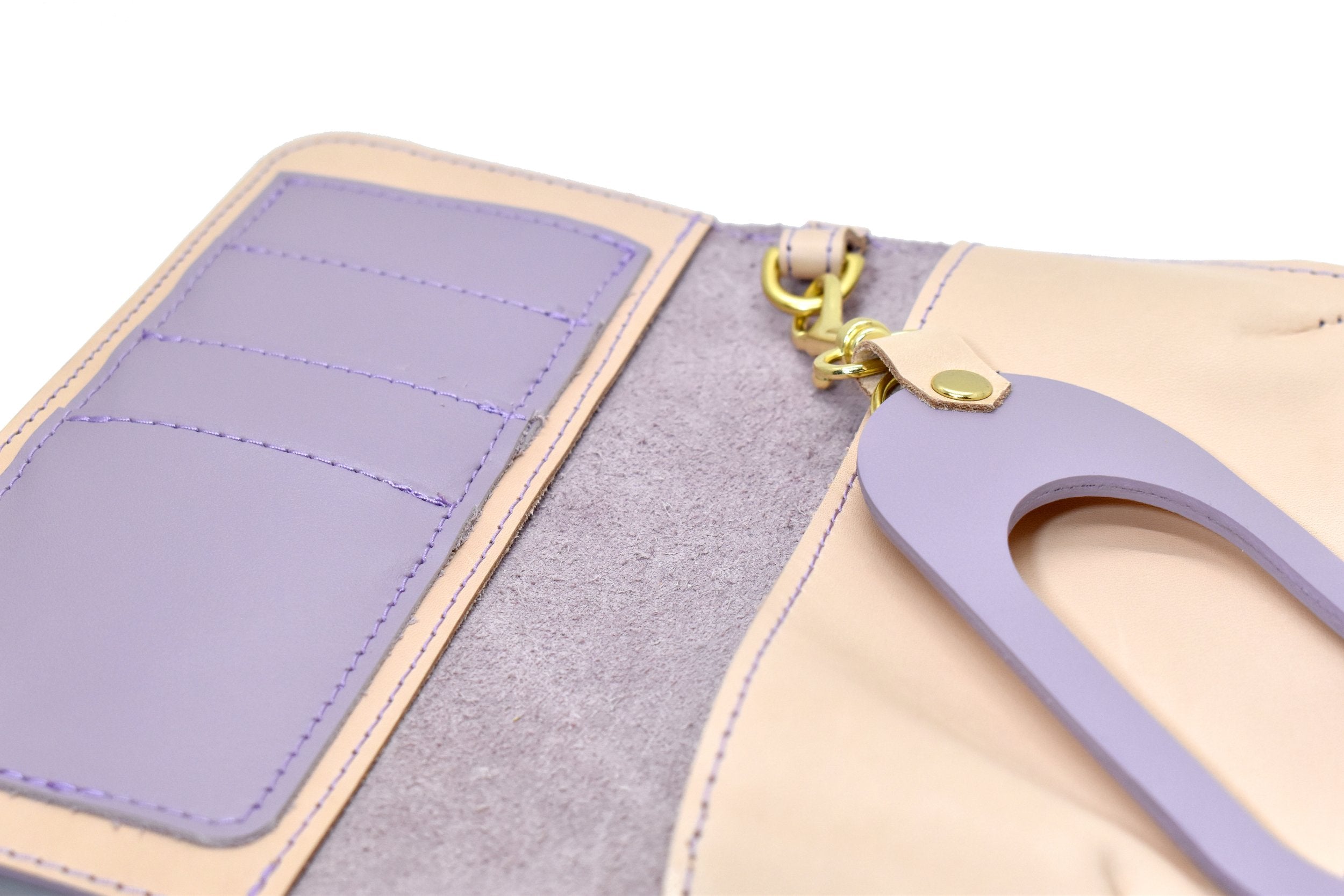 inside of lavender and veg tan leather wallet