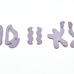 three pairs of irregular shape oversized statement earrings in lavender leather.