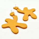 organic shape linked leather cutout earrings marigold leather matisse style oversized earrings