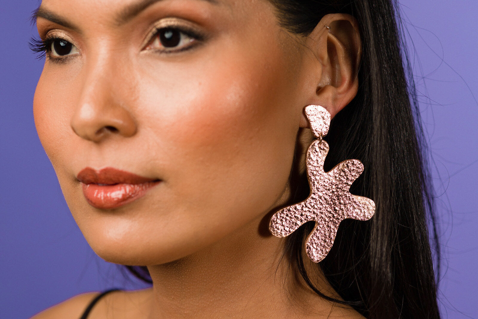 metallic rose gold star shaped earrings leather statement earrings pink jewelry
