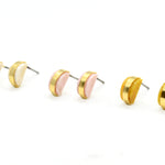 crystal quartz, rose quartz pink, and marigold yellow stud earrings in golden half moons.