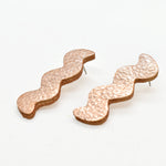 leather lightning strike cutout matisse earrings in metallic rose gold leather