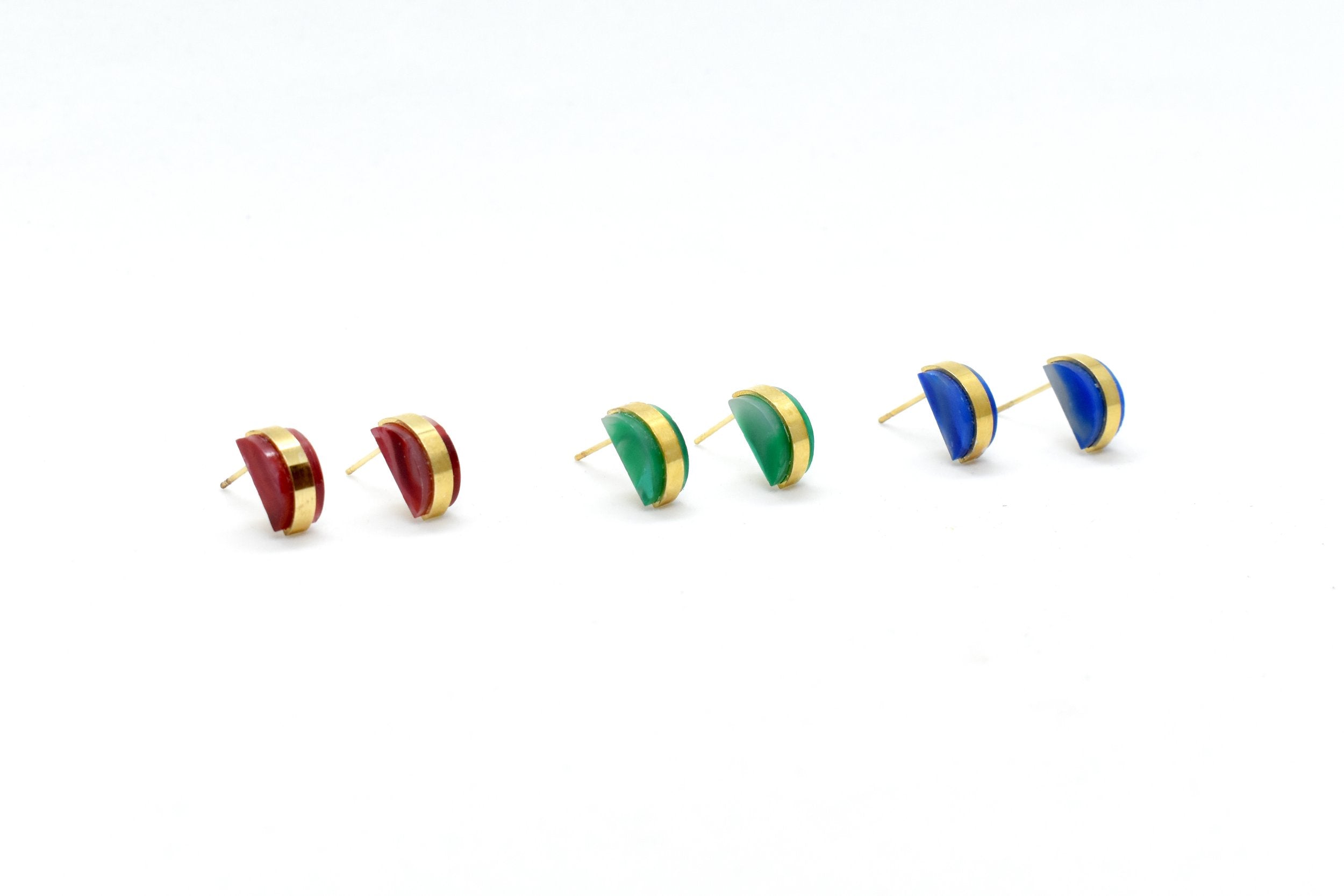set fo three pairs of tiny gold studs. ruby studs, sapphire earrings, emerald stud earrings that are perfect for birth stone gifts for her gemstone earrings jewelry