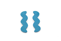 wavelength shape leather statement earrings in deep turquoise.